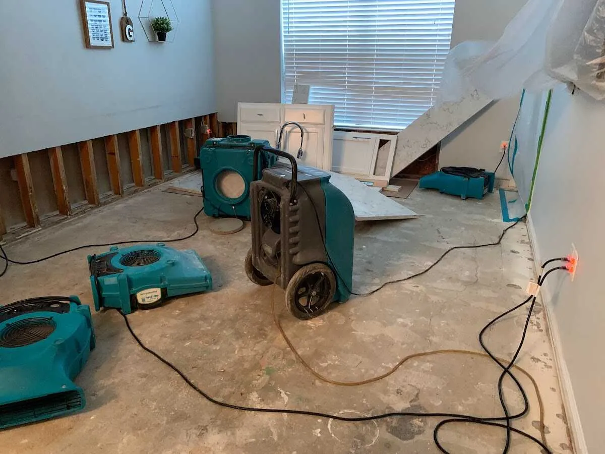 Dehumidifier in flood-cut room for Water Damage Restoration in Juneau